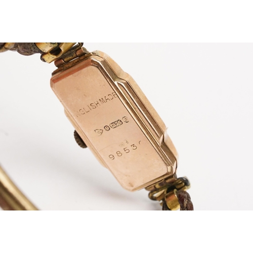 302 - 9ct gold Art Deco wrist watch having a rectangular face with arabic numerals to the chapter ring, mo... 