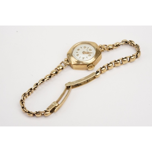 304 - 9ct gold Rotary ladies wrist watch having a round face with arabic numerals to the chapter ring set ... 