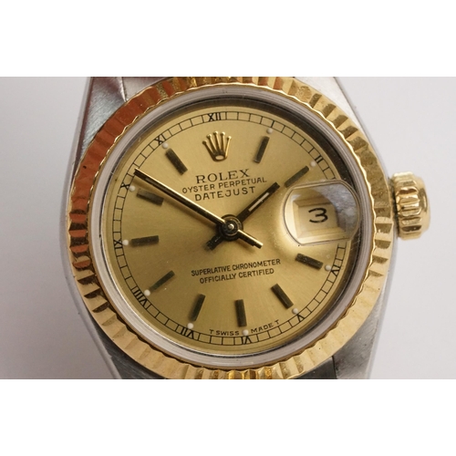 305 - Rolex oyster perpetual datejust wristwatch having a gilt face with baton markers to the chapter ring... 