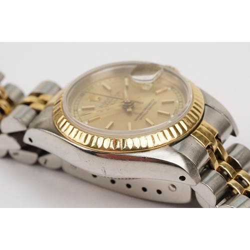 305 - Rolex oyster perpetual datejust wristwatch having a gilt face with baton markers to the chapter ring... 