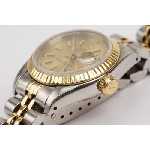 305 - Rolex oyster perpetual datejust wristwatch having a gilt face with baton markers to the chapter ring... 