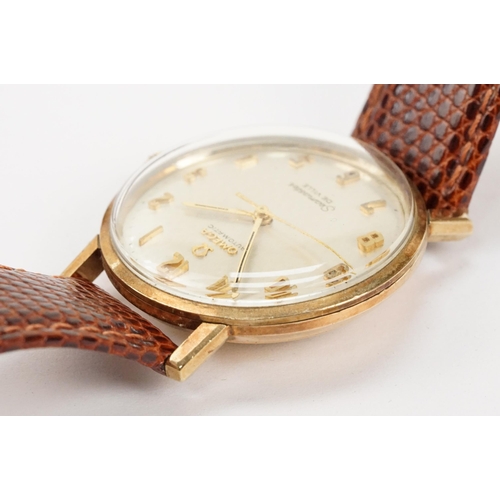 306 - Omega Seamaster De Ville automatic 9ct gold case wristwatch. The watch having a silvered dial with a... 