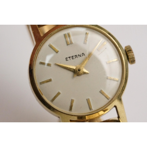 307 - 9ct gold Eterna cocktail watch having a round face with baton markers to the chapter ring on a 9ct g... 