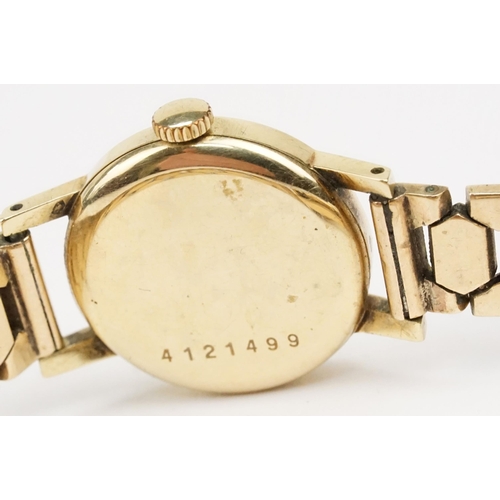 307 - 9ct gold Eterna cocktail watch having a round face with baton markers to the chapter ring on a 9ct g... 