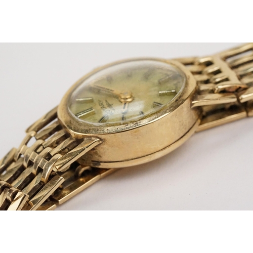 310 - 9ct gold Rotary wrist watch having an oval face with gate link bracelet. Hallmarked Birmingham 1978.... 