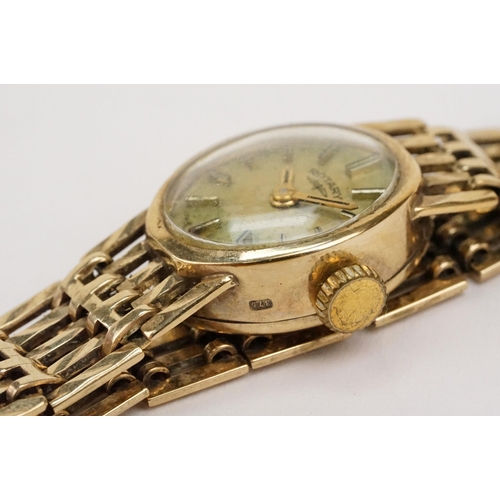 310 - 9ct gold Rotary wrist watch having an oval face with gate link bracelet. Hallmarked Birmingham 1978.... 