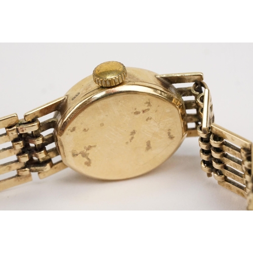 310 - 9ct gold Rotary wrist watch having an oval face with gate link bracelet. Hallmarked Birmingham 1978.... 