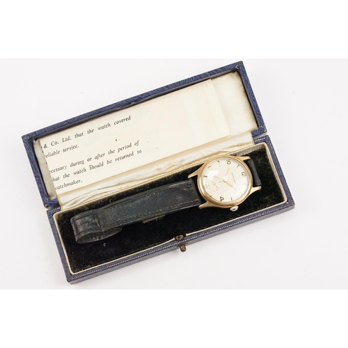 315 - Garrard 9ct gold mid Century wrist watch having a cream dial with arabic and baton markers to the ch... 