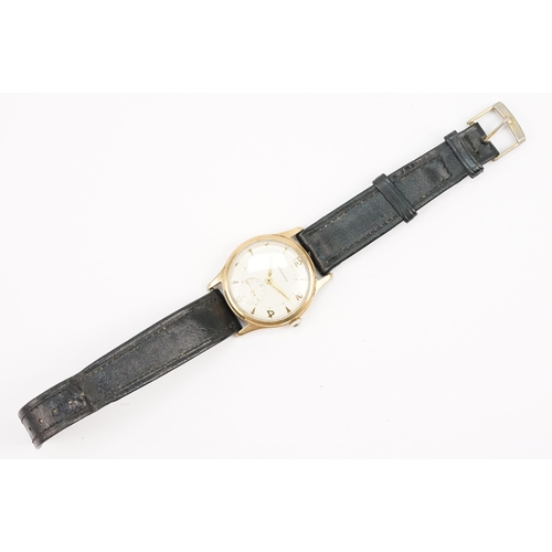 315 - Garrard 9ct gold mid Century wrist watch having a cream dial with arabic and baton markers to the ch... 