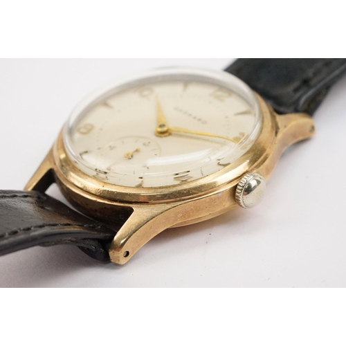 315 - Garrard 9ct gold mid Century wrist watch having a cream dial with arabic and baton markers to the ch... 