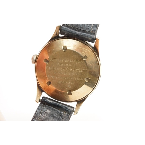 315 - Garrard 9ct gold mid Century wrist watch having a cream dial with arabic and baton markers to the ch... 