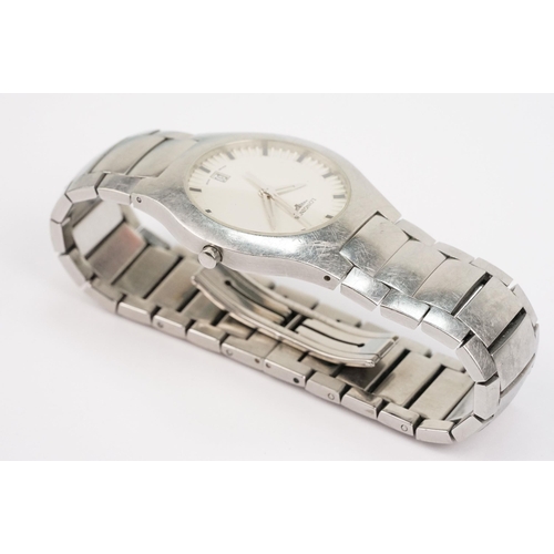 316 - Longines stainless steel wrist watch having a round face with white dial, baton markings to the chap... 