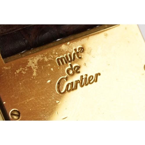 318 - Must de Cartier silver cased tank watch having a rectangular face with roman numerals to the chapter... 