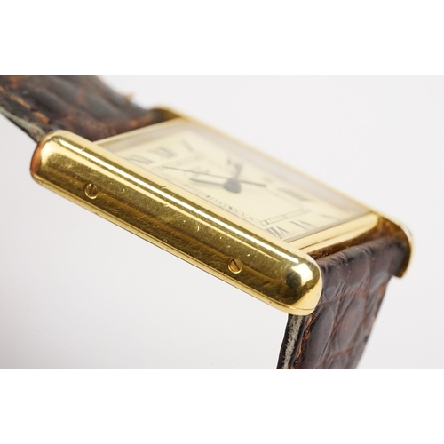 318 - Must de Cartier silver cased tank watch having a rectangular face with roman numerals to the chapter... 