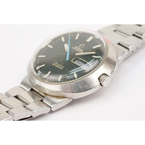 320 - Omega automatic geneve dynamic stainless steel wrist watch. The watch having a round black face with... 