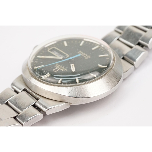 320 - Omega automatic geneve dynamic stainless steel wrist watch. The watch having a round black face with... 