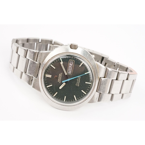 320 - Omega automatic geneve dynamic stainless steel wrist watch. The watch having a round black face with... 