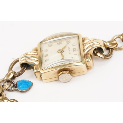 322 - 9ct gold Ravella wrist watch having a square face on a gold plated strap. Case measures approx 15mm ... 