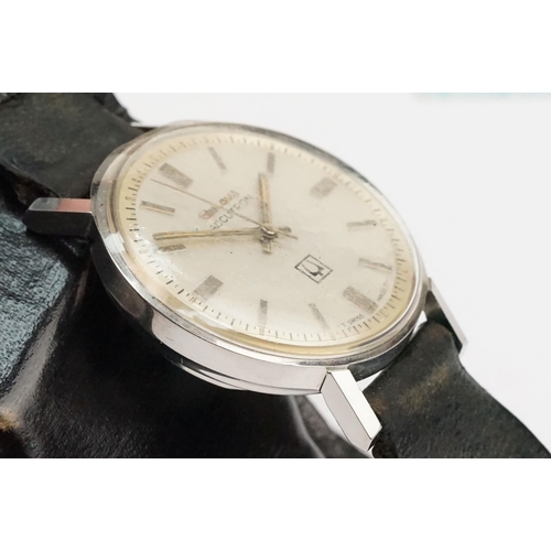 323 - Bulova Accutron 214 wristwatch having a round face with silvered dial and baton markers to chapter r... 