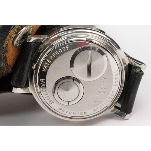 323 - Bulova Accutron 214 wristwatch having a round face with silvered dial and baton markers to chapter r... 