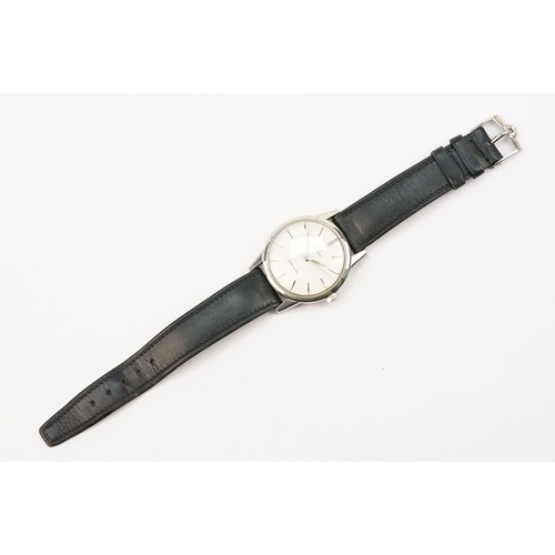 324 - 1960s Omega Seamaster wristwatch. The watch having a round face with silver baton markers to the cha... 