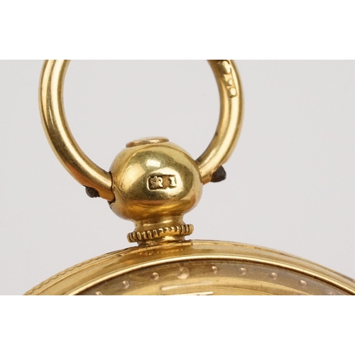 329 - 18ct gold open face pocket watch having a gilt face with engine turned and floral details and subsid... 