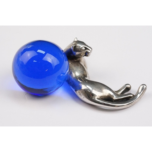 338 - Cartier silver panther paperweight in the form of a recumbent panther with blue glass orb. Signed Ca... 