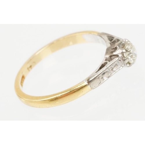 53 - 18ct gold diamond ring. The ring being set with a round brilliant cut diamond with platinum engraved... 