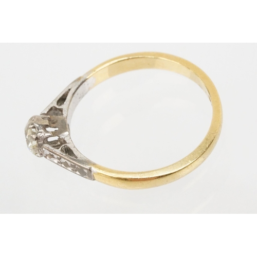 53 - 18ct gold diamond ring. The ring being set with a round brilliant cut diamond with platinum engraved... 