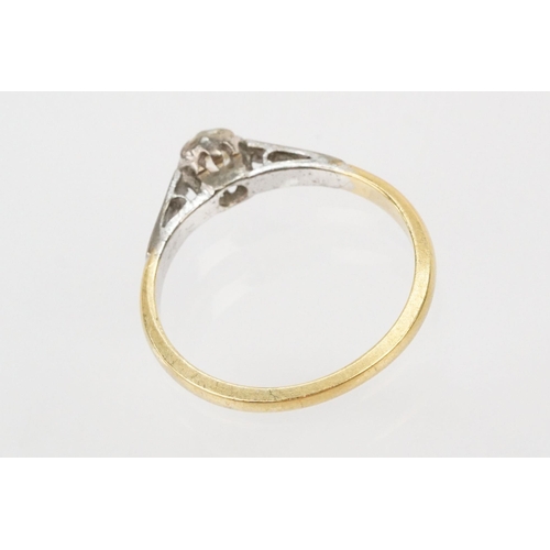 53 - 18ct gold diamond ring. The ring being set with a round brilliant cut diamond with platinum engraved... 