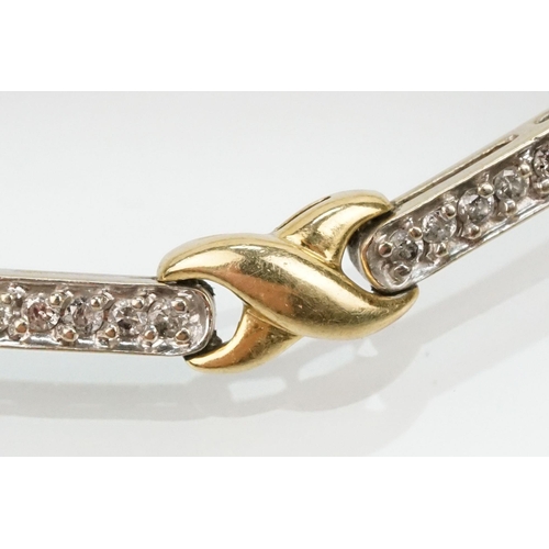 60 - 14ct gold two tone kiss link bracelet having diamond set bar links with a box clasp. Marked 14k to s... 