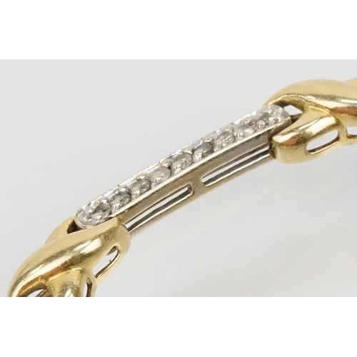 60 - 14ct gold two tone kiss link bracelet having diamond set bar links with a box clasp. Marked 14k to s... 