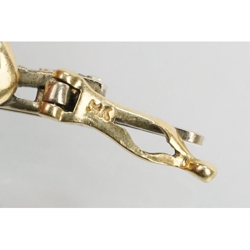 60 - 14ct gold two tone kiss link bracelet having diamond set bar links with a box clasp. Marked 14k to s... 