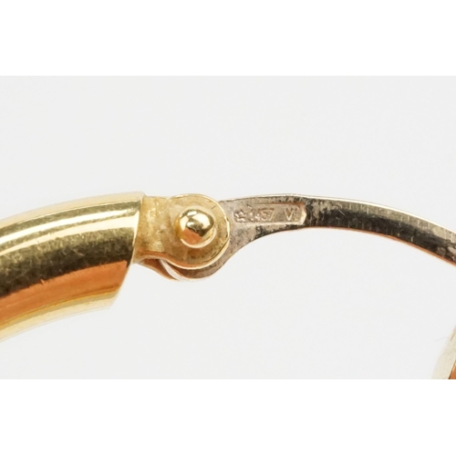 68 - Pair of 18ct gold hoop earrings having hinge posts with coiled detail to front. Italian hallmarked t... 