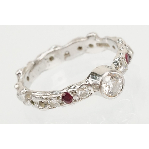 8 - Jane Watling 18ct white gold, diamond and ruby ring. The ring being bezel set with a round brilliant... 