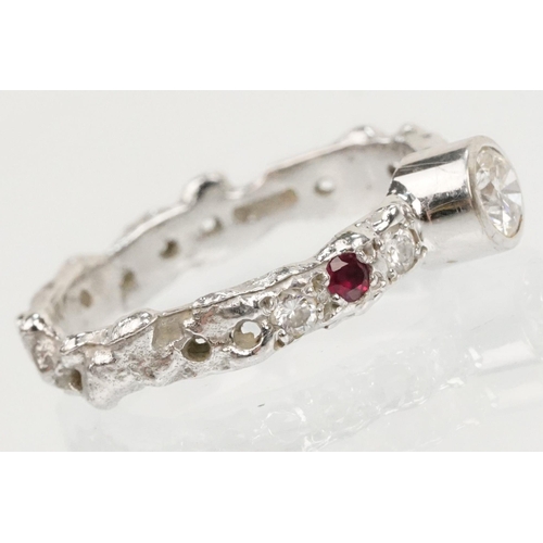 8 - Jane Watling 18ct white gold, diamond and ruby ring. The ring being bezel set with a round brilliant... 