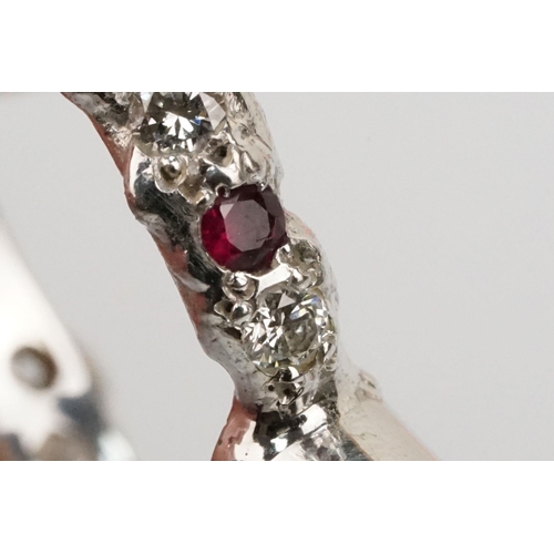 8 - Jane Watling 18ct white gold, diamond and ruby ring. The ring being bezel set with a round brilliant... 