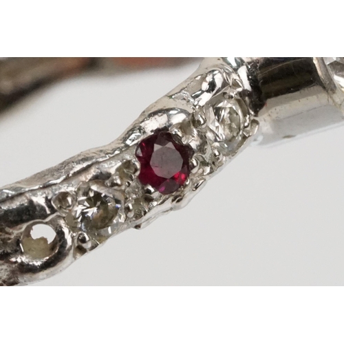 8 - Jane Watling 18ct white gold, diamond and ruby ring. The ring being bezel set with a round brilliant... 