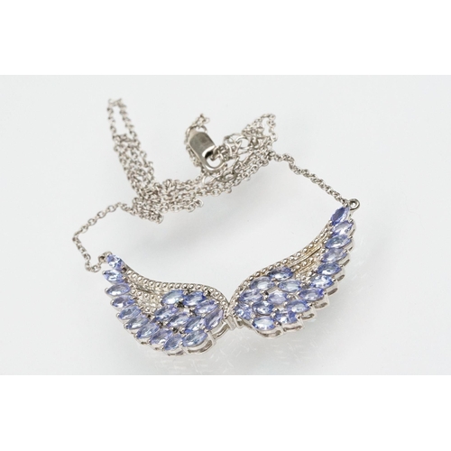 253 - Collection of silver and gem set jewellery to include a tanzanite angel wing necklace and earrings, ... 