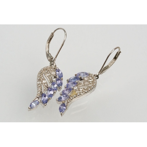 253 - Collection of silver and gem set jewellery to include a tanzanite angel wing necklace and earrings, ... 