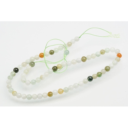 255 - Jade beaded necklace with silver clasp together with two collections of smaller jade beads mounted o... 