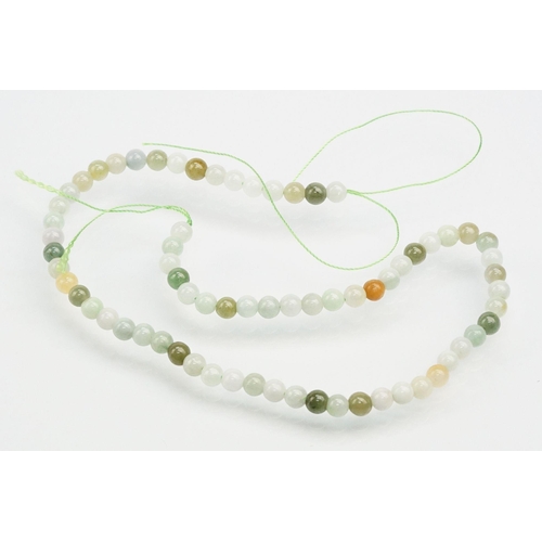 255 - Jade beaded necklace with silver clasp together with two collections of smaller jade beads mounted o... 