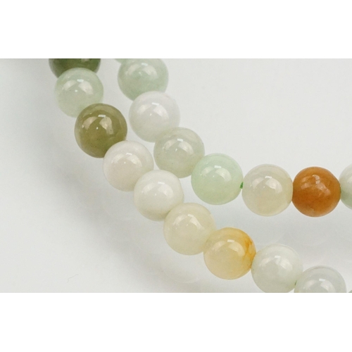 255 - Jade beaded necklace with silver clasp together with two collections of smaller jade beads mounted o... 