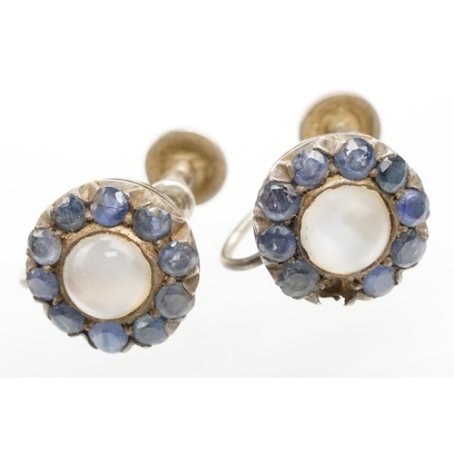 259 - Pair of silver, sapphire and moonstone cluster earrings with screw back fastenings (marked silver), ... 