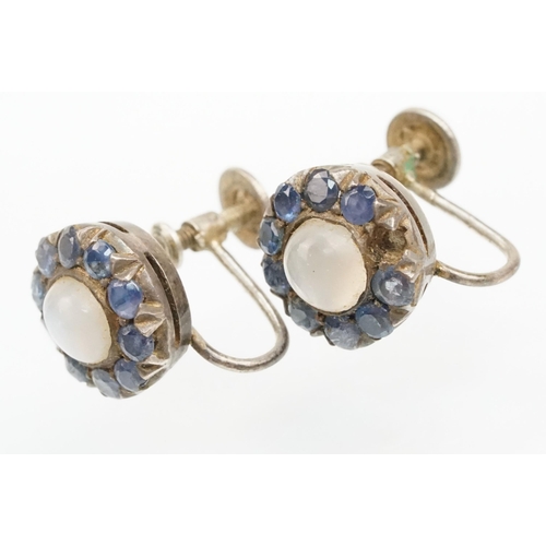 259 - Pair of silver, sapphire and moonstone cluster earrings with screw back fastenings (marked silver), ... 