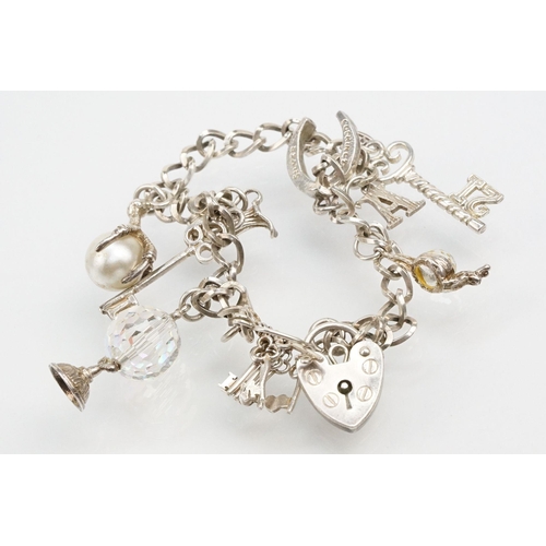 270 - Collection of silver jewellery to include a Pandora bangle bracelet with two beads, three vintage ch... 