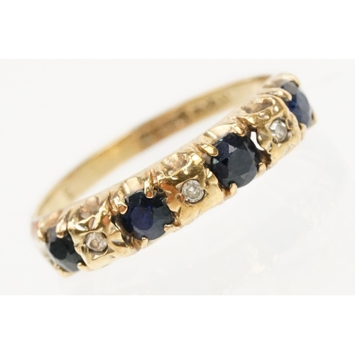 274 - 9ct gold sapphire and diamond ring. The ring being set with four round cut sapphires with diamond ac... 