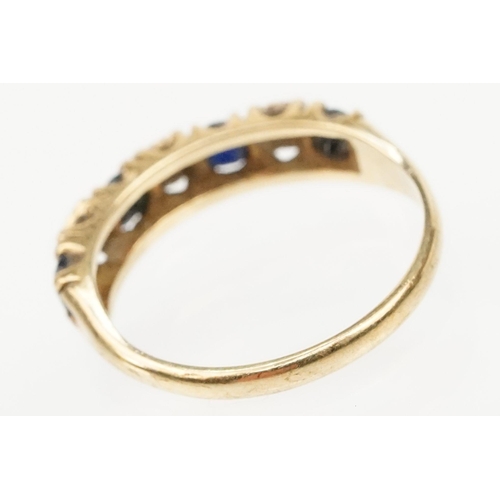 274 - 9ct gold sapphire and diamond ring. The ring being set with four round cut sapphires with diamond ac... 