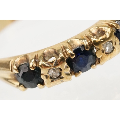 274 - 9ct gold sapphire and diamond ring. The ring being set with four round cut sapphires with diamond ac... 