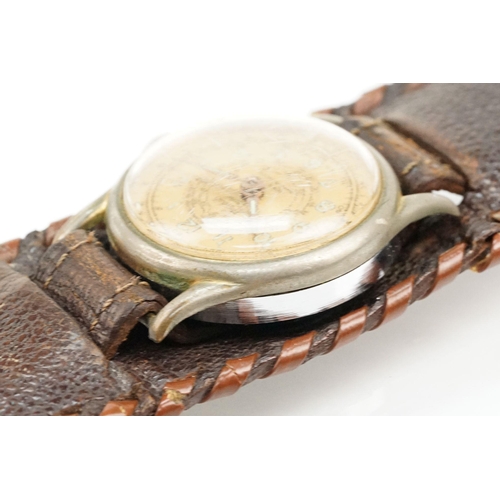 281 - Vintage mid 20th Century Basis Sport chronograph wrist watch with a gilt face and enamelled arabic n... 